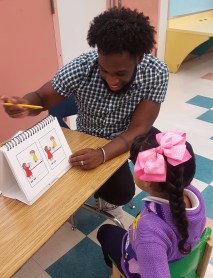 Doctoral student conducting language assessment